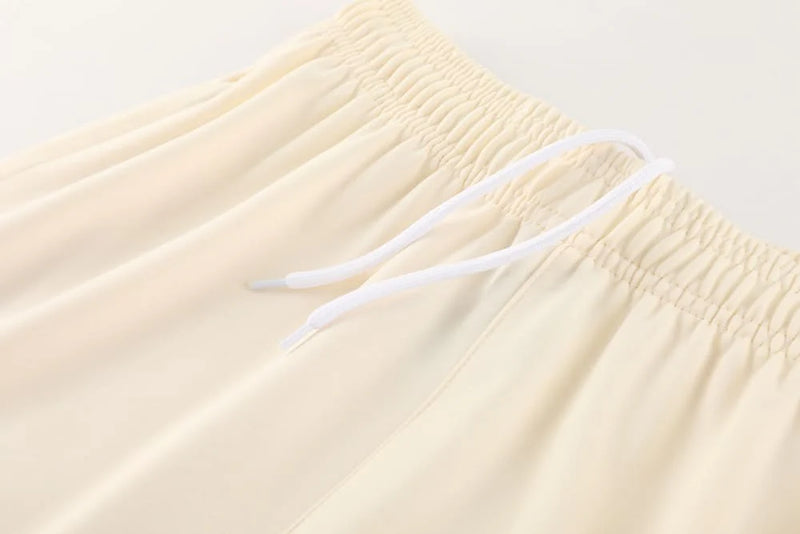 Conjunto Nike Dri-Fit de Frio - Jaqueta + Calça, Creme